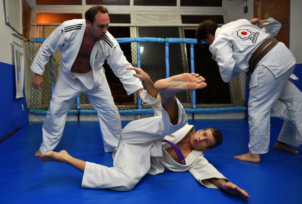 The author (on the ground) takes a tumble during his judo class in Rio de Janeiro, August 29, 2018.
