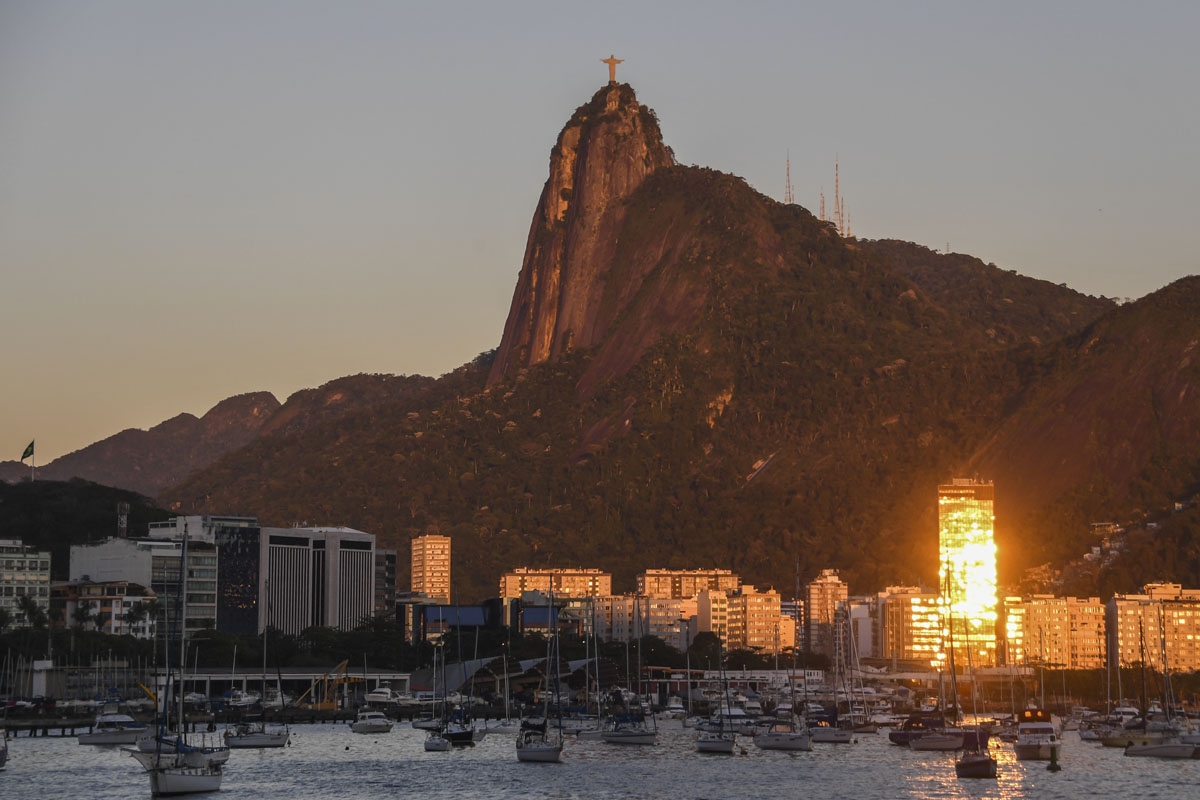 View of the Botafogo cove in the Guanabara Bay with Christ the Redeemer statue atop the Corcovado mountain, at dawn in Rio de Janeiro, Brazil, on September 4, 2017.