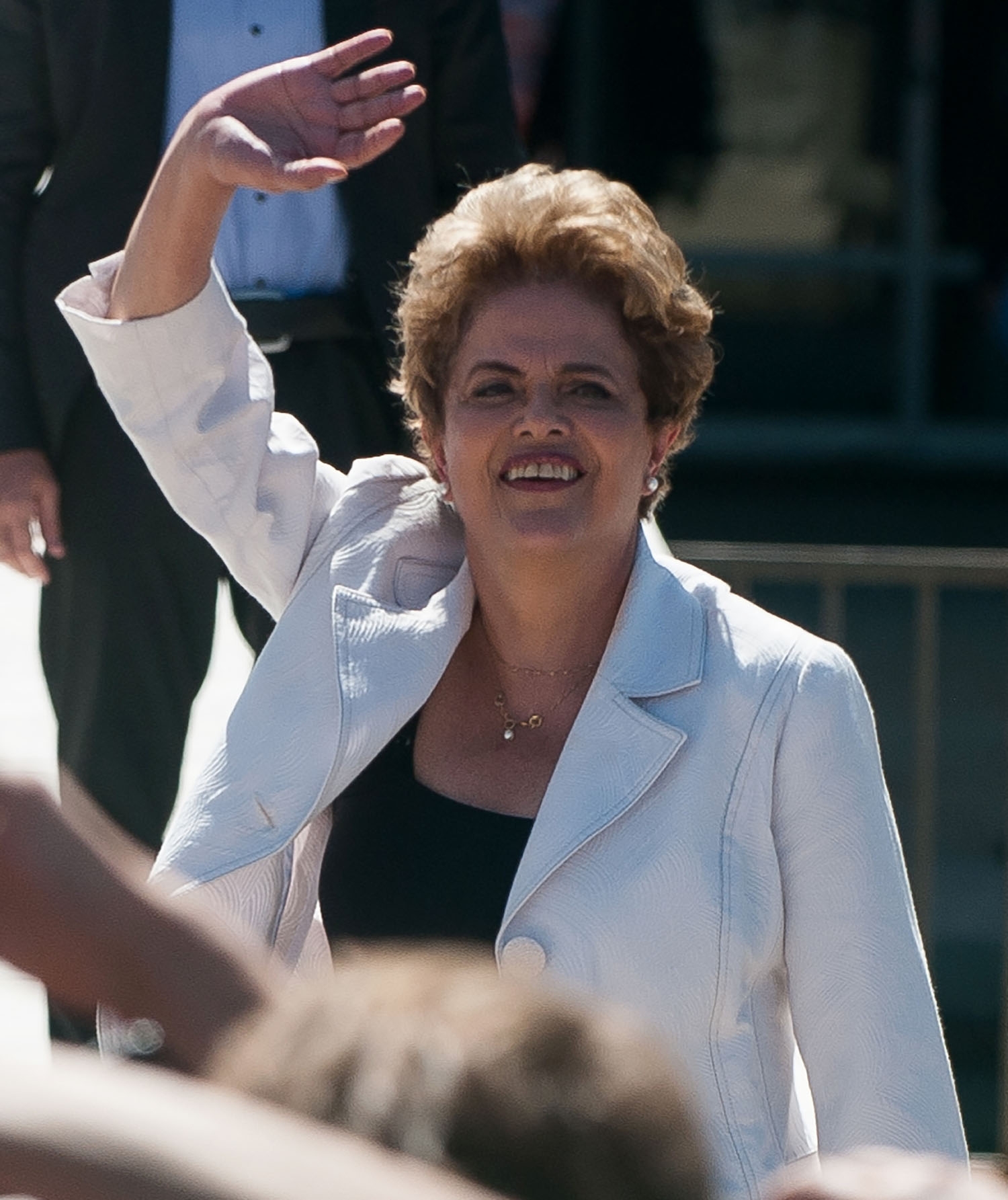 Brazil's suspended President Dilma Rousseff waves to supporters as she leaves Planalto Palace in Brasilia on May 12, 2016 Brazil's suspended President Dilma Rousseff waves to supporters as she leaves Planalto Palace in Brasilia on May 12, 2016