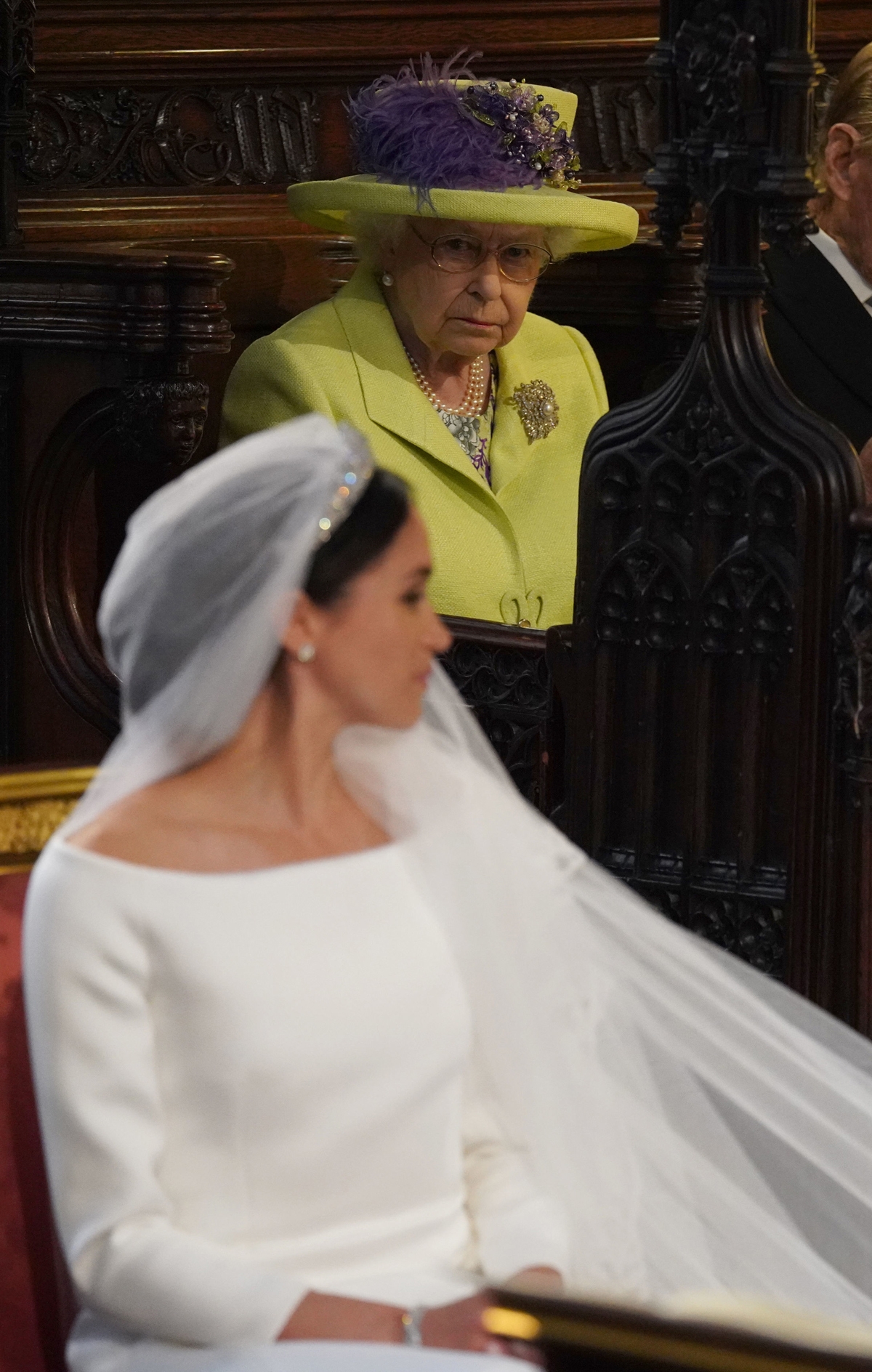 Britain's Queen Elizabeth II looks on during the wedding ceremony of Britain's Prince Harry, Duke of Sussex and US actress Meghan Markle in St George's Chapel, Windsor Castle, in Windsor, on May 19, 2018.