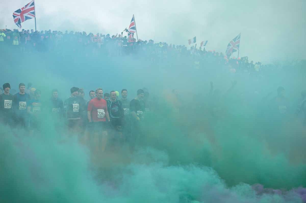 Competitors take part in the 'Tough Guy' adventure race near Wolverhampton, central England, on January 29, 2017. The Tough Guy event, which is being held for the final time in its 30th year, challenges thousands of competitors to run a gruelling course