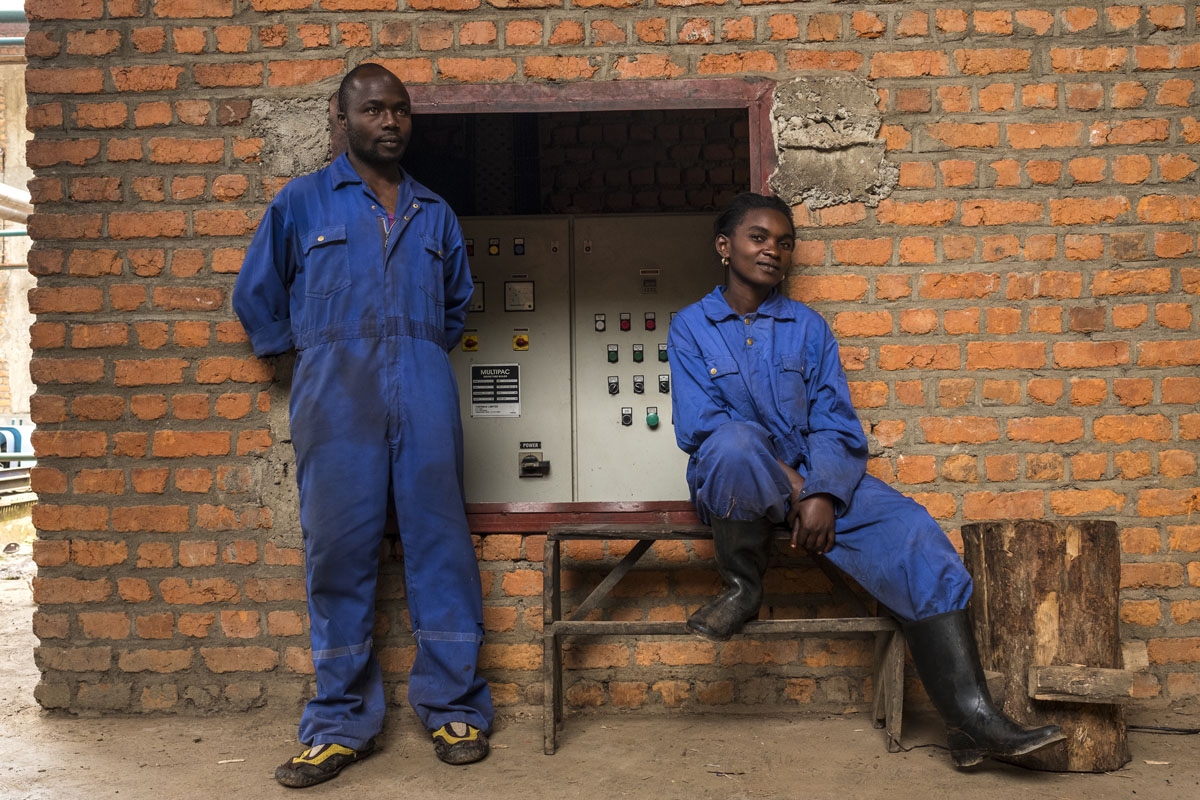 Workers are pictured at the Crystal Soap factory in Butembo on November 12, 2016.