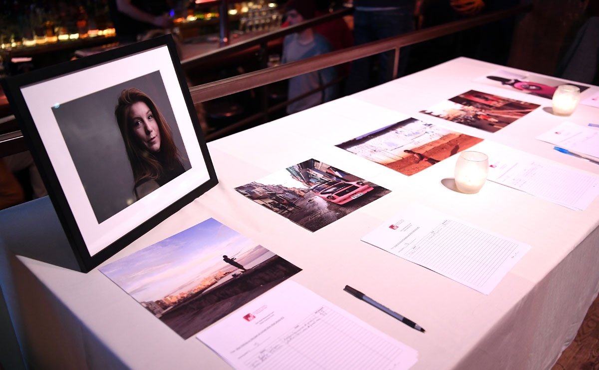 A silent auction with Kim Wall's photographs on display at the inaugural grant ceremony for The Kim Wall Memorial Fund at Superfine on March 23, 2018 in New York City.