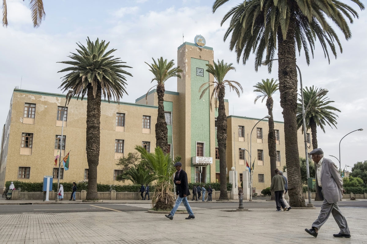A man walks past a government building in the Eritrean capital Asmara on July 21, 2018.