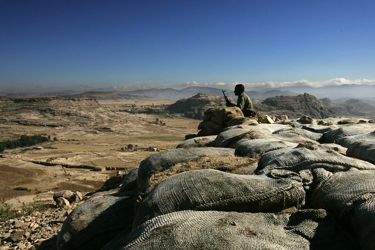 An Ethiopian soldier mans an observation post facing the Temporary Security Zone on the Eritrean border at the northern town of Zala Anbessa in the Tigray region of Ethiopia, 19 November 2005.