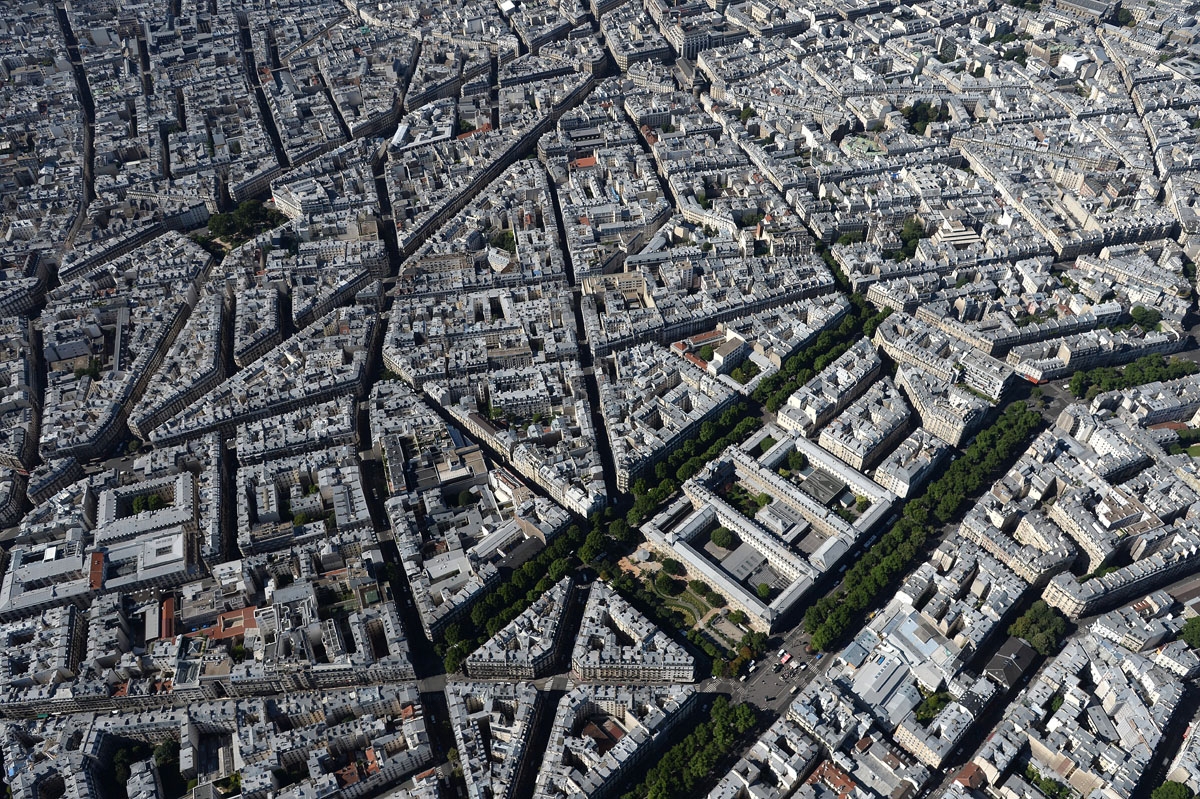 A picture taken on July 14, 2017 shows an aerial view of the city of Paris. /