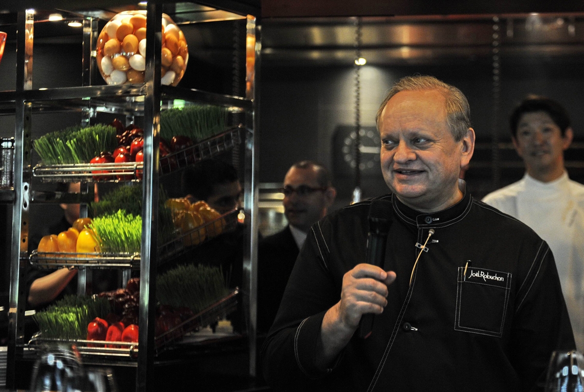 Joel Robuchon speaks to the media at his Atelier restaurant in Singapore, April, 2011.