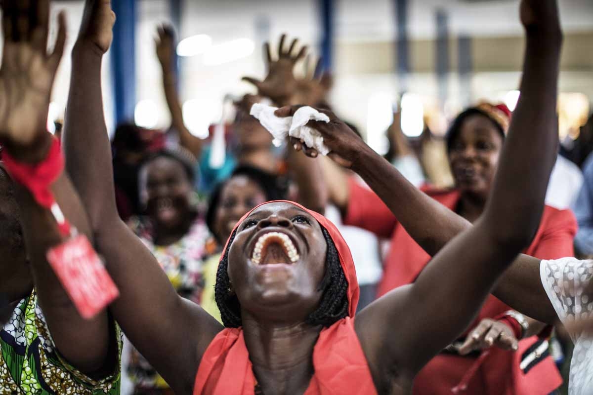 Christians dance on September 4, 2016 in Libreville, during the Sunday service at the Nazareth Evangelical Church which belongs to Pastor Georges Bruno Ngoussi. 