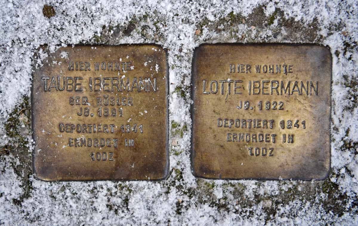 Two Stolpersteine (stumbling blocks), commemorating Holocaust victims, are pictured in front of Fehrbellinerstrasse 86 in Berlin on January 5, 2017. The small plaques the size of a child's hand state the fate of a mother and daughter who lived in a small