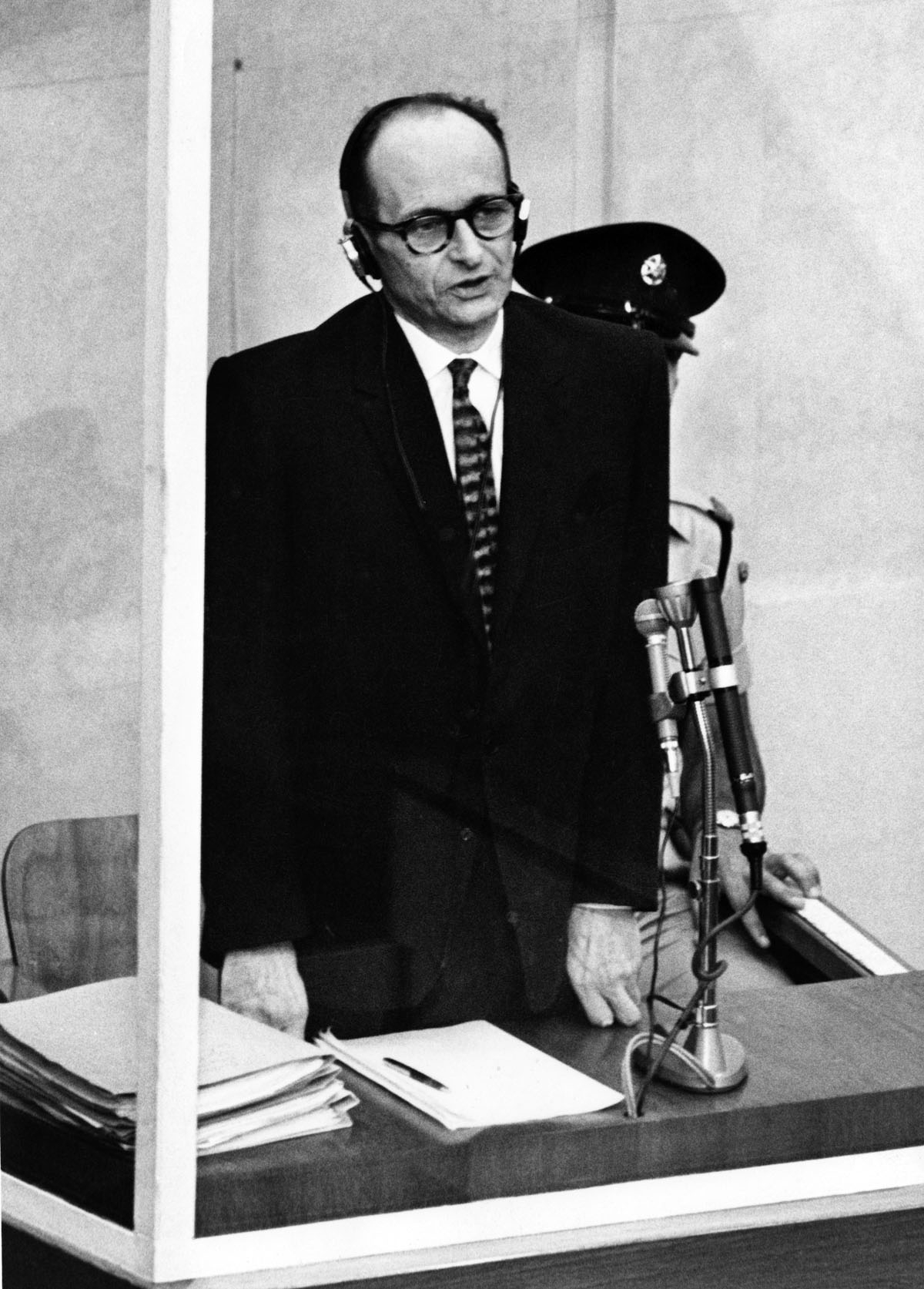 Nazi war criminal Adolf Eichmann testifies in his bullet-proof dock during the first day of his trial in front of an Israeli court, 11 April 1961, in Jerusalem. Former Nazi SS leader, and one of the main organizers of the extermination camps in Nazi-occup