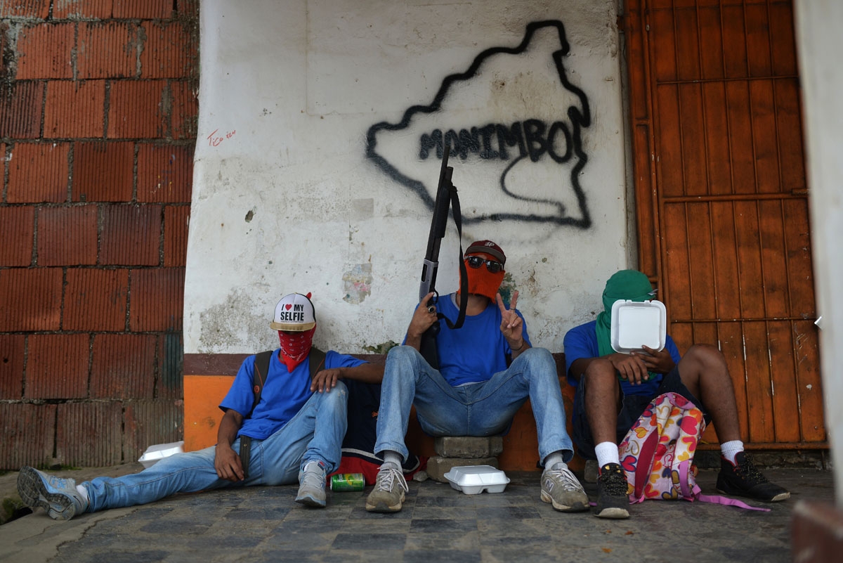 Paramilitaries rest in Monimbo neighborhood in Masaya, Nicaragua, on July 18, 2018, following clashes with anti-government demonstrators. The head of the Inter-American Commission on Human Rights has described as "alarming" the ongoing violence in Nicarag