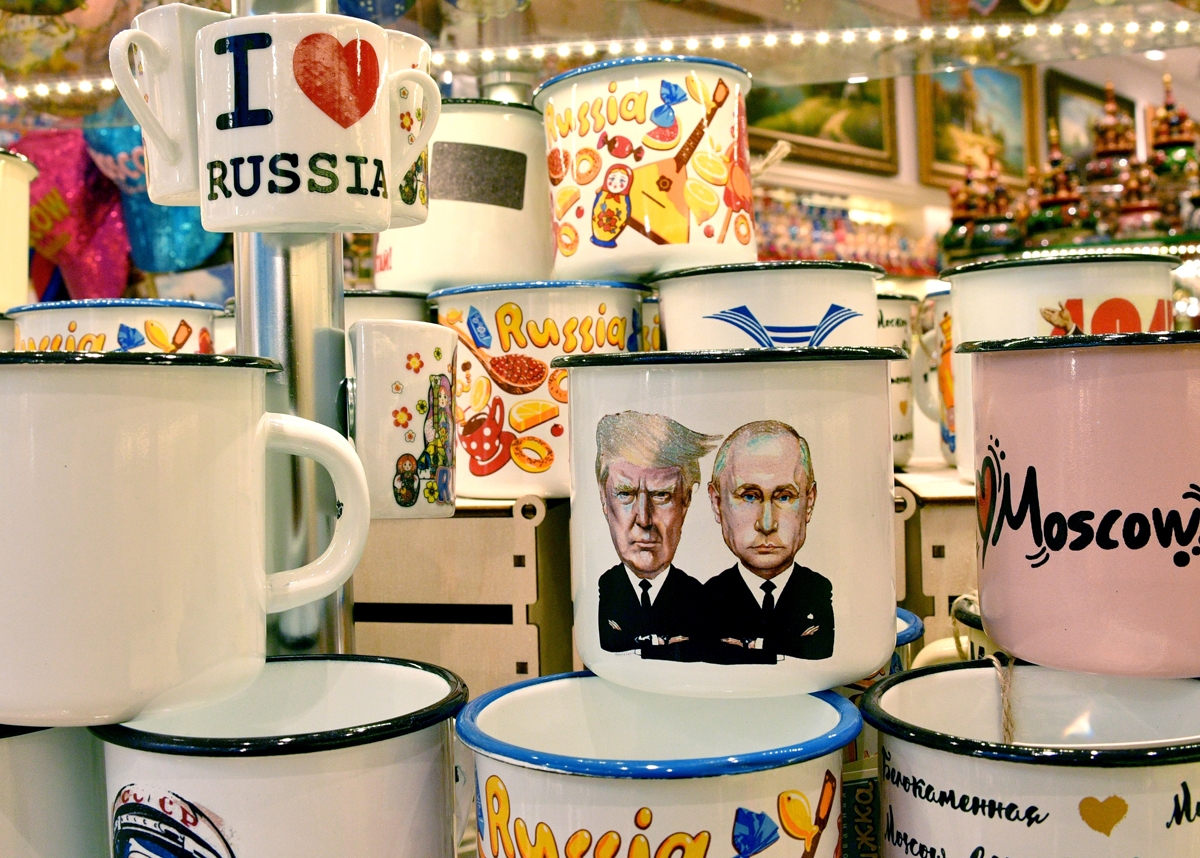 A picture taken on July 5, 2017 shows a souvenir shops offering among others cup a tin mug depicting Russian President Vladimir Putin and US President Donald Trump, in Moscow.