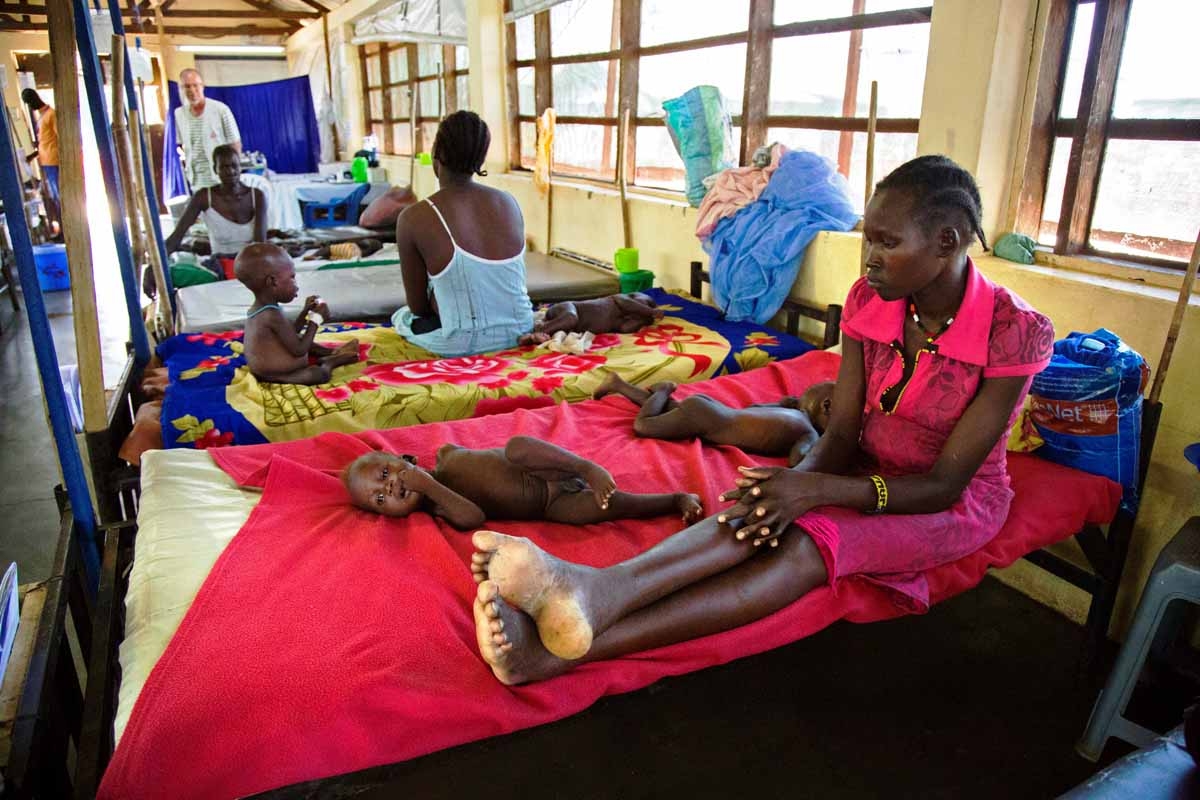 Women are pictured with their malnourished children at the clinic run by Doctors without Borders (MSF) in Aweil, Northern Bahr al Ghazal, South Sudan, on October 11, 2016.