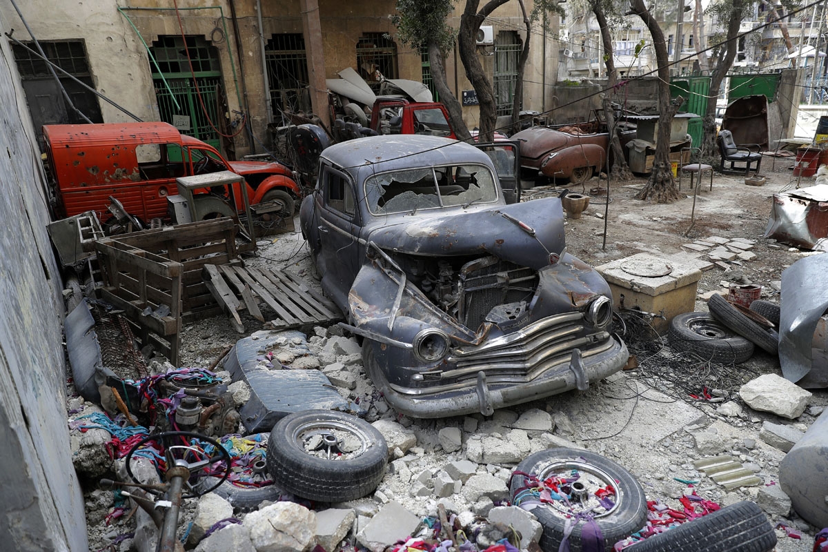 A picture taken on March 9, 2017, shows a 1947 Plymouth parked in the garden of Mohammad Mohiedine Anis' home in Aleppo's formerly rebel-held al-Shaar neighbourhood.