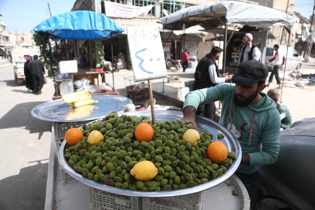 New life -- enjoying no shortage of food for the first time in years in Idlib province.