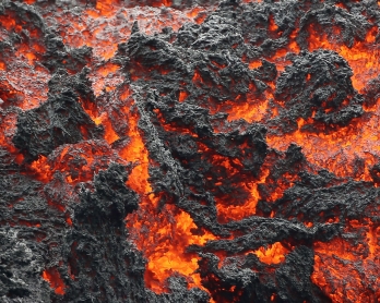PAHOA, HI - MAY 12: Lava flows at a lava fissure in the aftermath of eruptions from the Kilauea volcano on Hawaii's Big Island, on May 12, 2018 in Pahoa, Hawaii. T